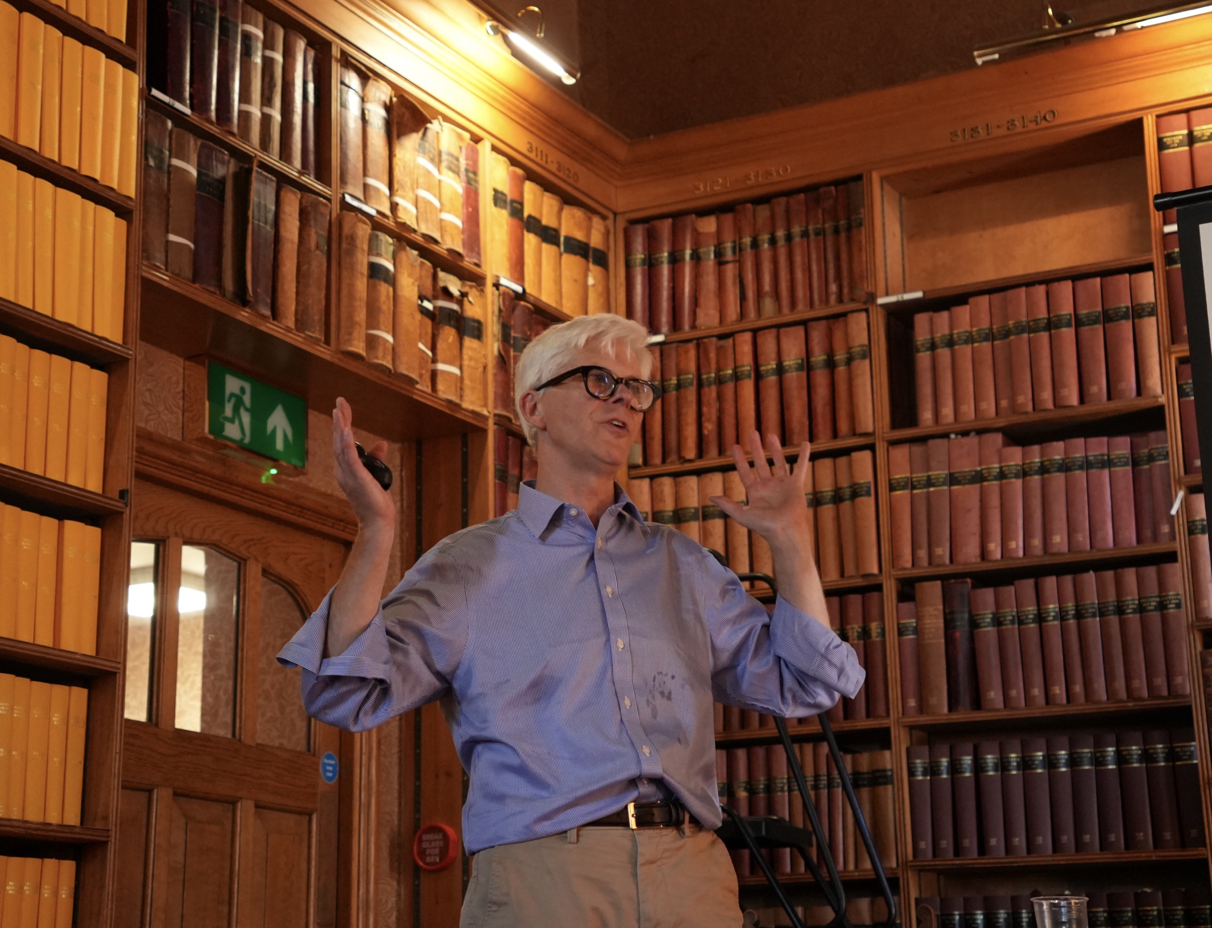An Oxford academic speaking in an Oxford library