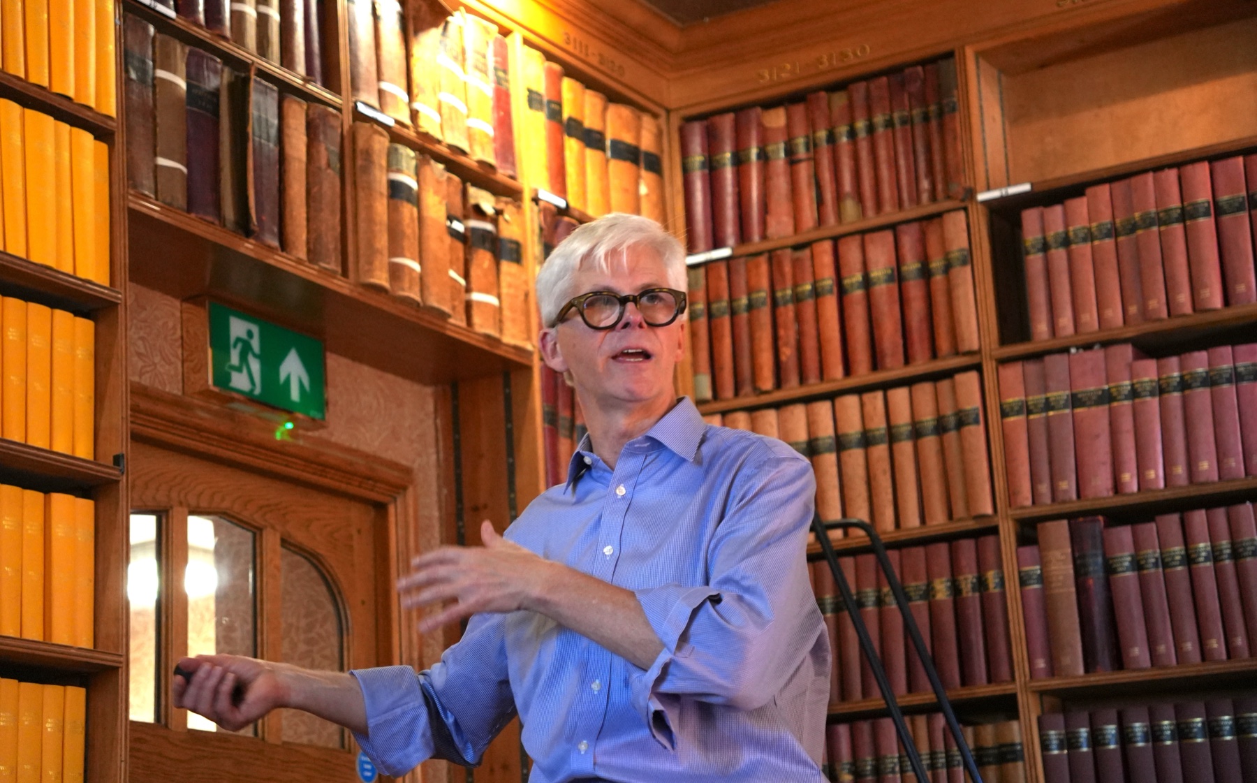 An Oxford Global Forum speaker addressing students in an Oxford library