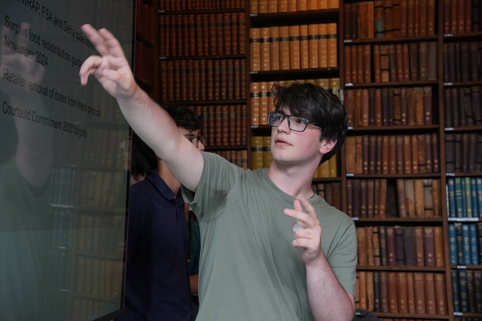 A student developing an argument during an academic session in Oxford